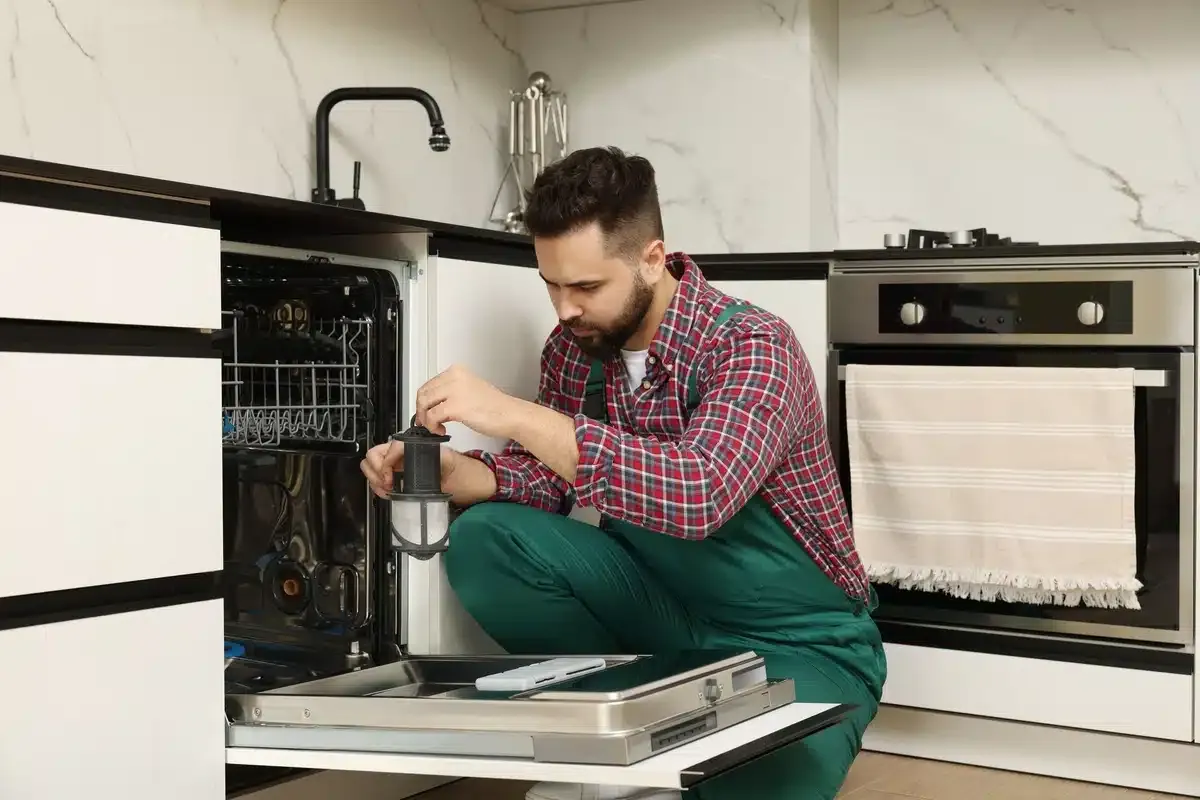 dishwasher being serviced by a repair tech dishwasher being serviced by a repair tech