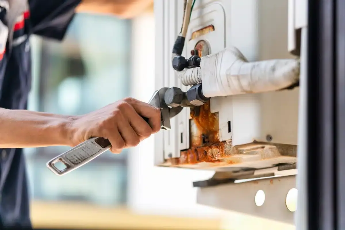heat not working in house-technician using hand tools on furnace system heat not working in house-technician using hand tools on furnace system