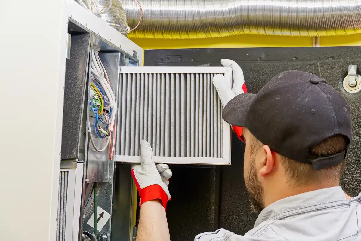 furnace replacement cost-technician replacing furnace filter furnace replacement cost-technician replacing furnace filter