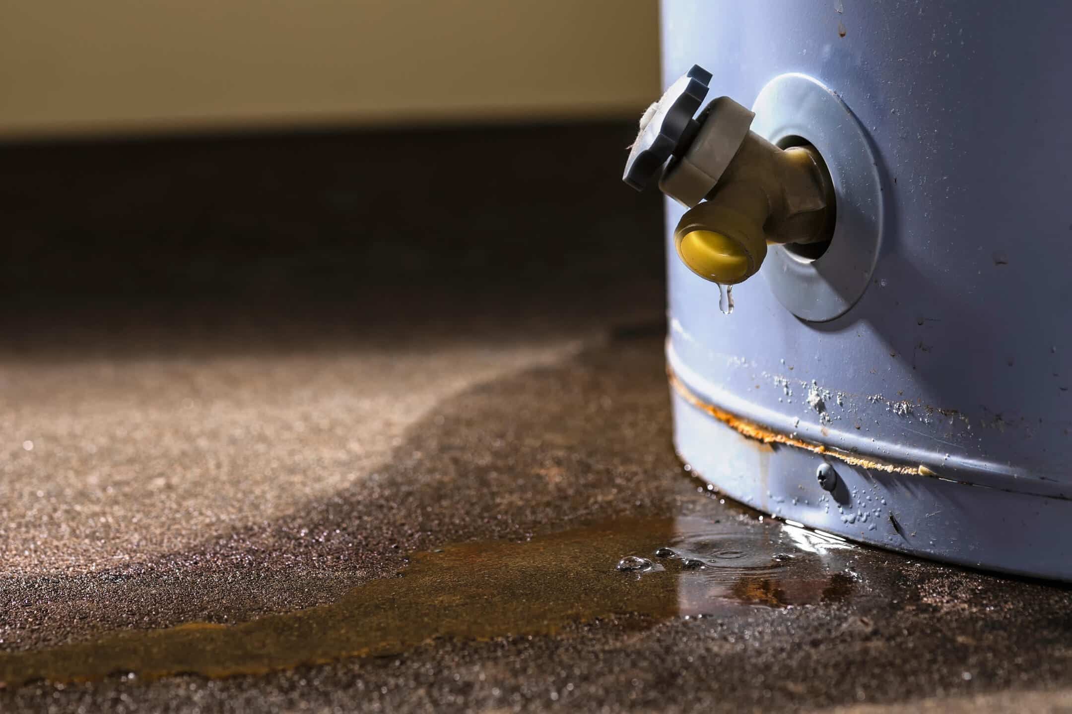 hot water heater leaking-close up of water heater tank leaking hot water heater leaking-close up of water heater tank leaking
