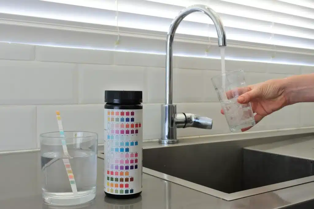 water test kit filling water from the tap