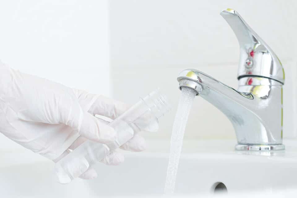 signs of hard water-testing water from tap for hardness