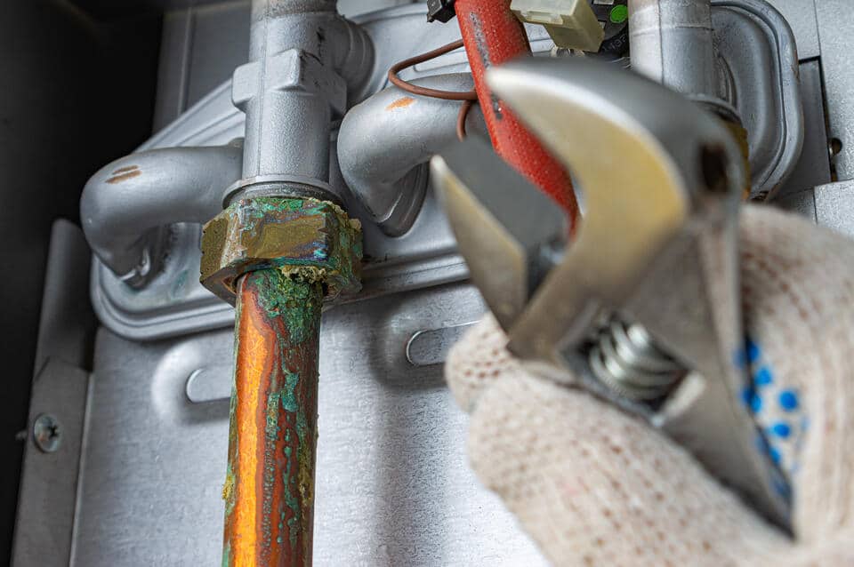 plumbing issues-pipe corrosion on appliance