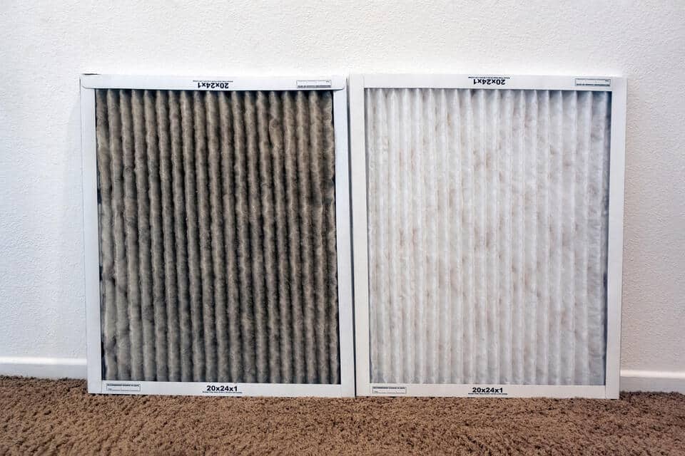 indoor air quality testing-air filters side by side, one dirty one clean