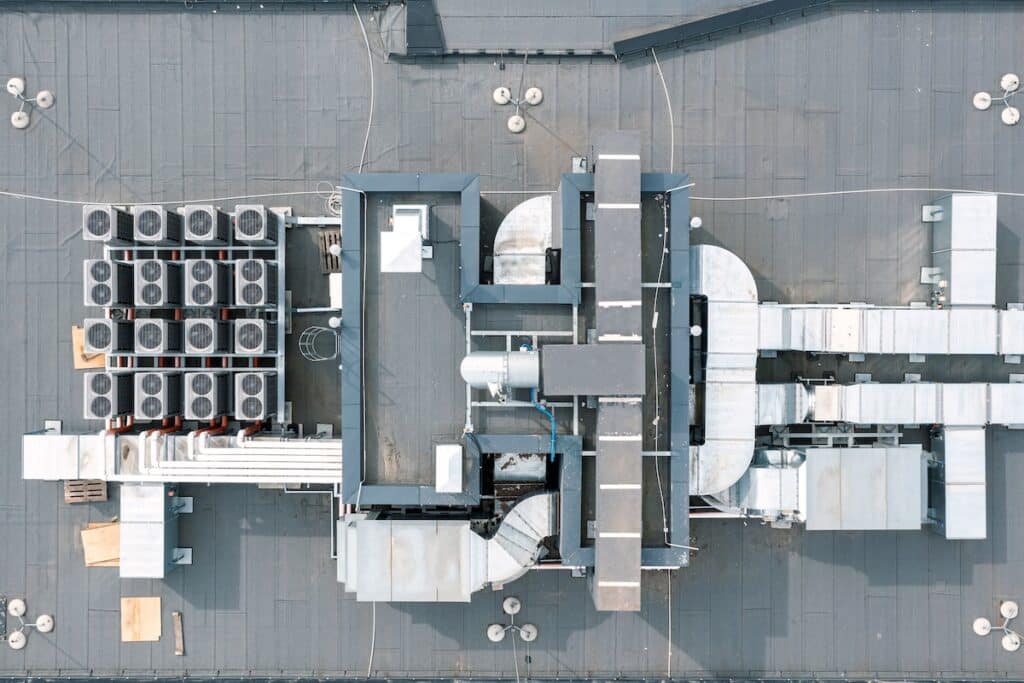 Efficient ventilation system on the roof of the house, air conditioner fans, ventilation system on the roof of residential buildings, aerial view